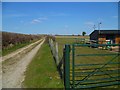 Restricted byway leaves Fobdown Farm