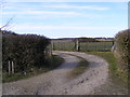 TM4470 : The entrance to Charity Farm by Geographer
