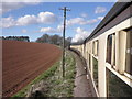 Minehead train passes Pixford Farm