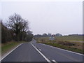 TM2993 : Entering Hedenham on the B1332 Norwich Road by Geographer