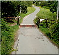 Folly Lane cattle grid near a stream east of Trevethin, Pontypool