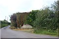 Barn covered in creepers at Upper Ripperston Farm