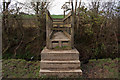 A footbridge over a stream which runs into Langham Lake