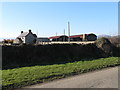 Farm on Ballyveaghbeg Road with red roofed hay sheds