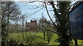 View of Redbridge Pumping Station through the trees from Redbridge Lane W