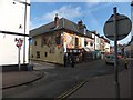 Artwork on shop facade in Ross-on-Wye