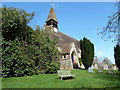 Seat outside St Mary, West Dean