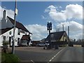 The car park and inn sign of the Royal Oak inn