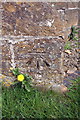 Benchmark on buttress of All Saints Church