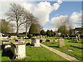 Clipped yews and table tombs, King