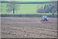 ST2243 : West Somerset : Tractor & Ploughed Field by Lewis Clarke