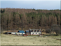 NH5791 : Cottage on north side of Strathcarron by Trevor Littlewood