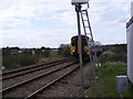 TM3976 : Train approaching Wenhaston Crossing by Geographer