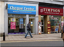 NT4936 : Cheque Centre and Timpson, Galashiels by Walter Baxter