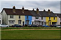 Colourful houses facing the cricket green, Reigate Heath