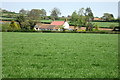 Arable field with Forest Farm in the distance