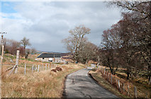 NH4791 : Minor road with building at The Craigs by Trevor Littlewood