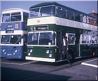 TQ2578 : Two Buses at Earls Court Exhibition Centre by David Hillas