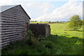 Farm building on the grass field