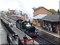 Steam hauled train leaving Bishops Lydeard