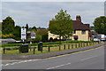 Grassed area with many signs on the corner of Salisbury Avenue