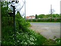 Footpath reaches the A4007 on Chandlers Hill