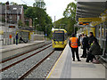 SJ8492 : Metrolink Tram at Burton Road by David Dixon