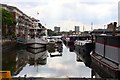 Boats moored by Rainbow Quay