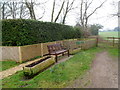 ST5291 : Bench alongside St Tewdric's Well, Mathern by Jaggery