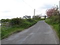 J0113 : View northwards along the L7105 by Eric Jones