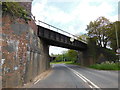 SY1298 : A railway bridge over the B3177 by Ian S