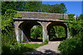 Bridge carrying A3057 over disused railway line