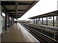 TQ3776 : DLR at Deptford Bridge by Ian S