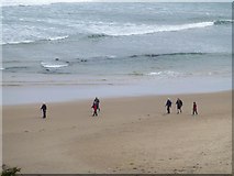 D0143 : Walkers on the beach, Whitepark Bay by Kenneth  Allen