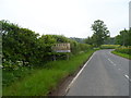 TL6153 : Road into Weston Colville with antiquated sign by Bikeboy