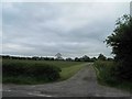 Farm road to Wood Side Farm off the A1103