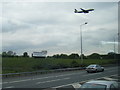 View from M25 in Poyle direction with aircraft on final approach to Heathrow