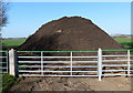 Huge pile of earth along Normanton Lane