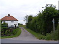 TM4481 : Hall Farm Cottages & footpath to North Green Cottages by Geographer
