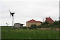 New house and wind generator by the footpath to Brauncewell