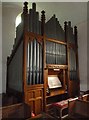 ST9515 : St Laurence, Farnham: organ by Basher Eyre
