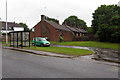 Bus stop and sheltered housing on Heath Road