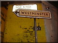 TQ2476 : Pre-Worboys direction arrow on New Kings Road by David Howard