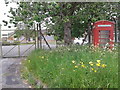 Telephone box next to an entrance into Wroughton airfield