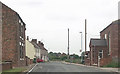 Road through Whitgift at phone box