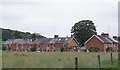 Cottages in a field