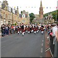 The pipes and drums lead the way