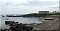 Divers in the sea at Beadnell beach