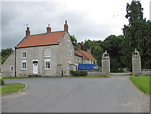 SE7967 : Gateposts at the entrance to Langton Hall by Pauline E