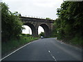 B802 Howe Road passes under railway viaduct